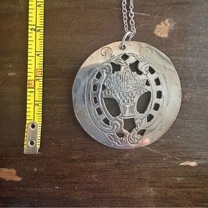 Flower Basket, Salvaged metal pendant made by my parents!